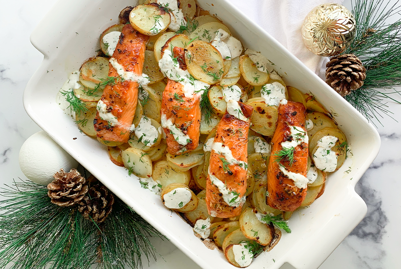 smoked salmon potato bake with holiday decorations next to the dish